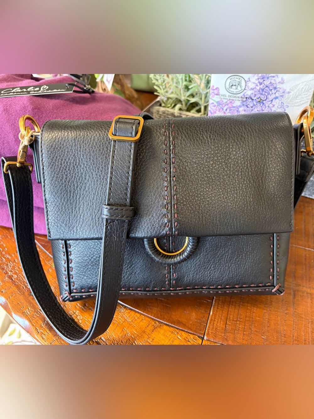 HOBO Austin Flap Black Leather Crossbody Bag with Gold Accent